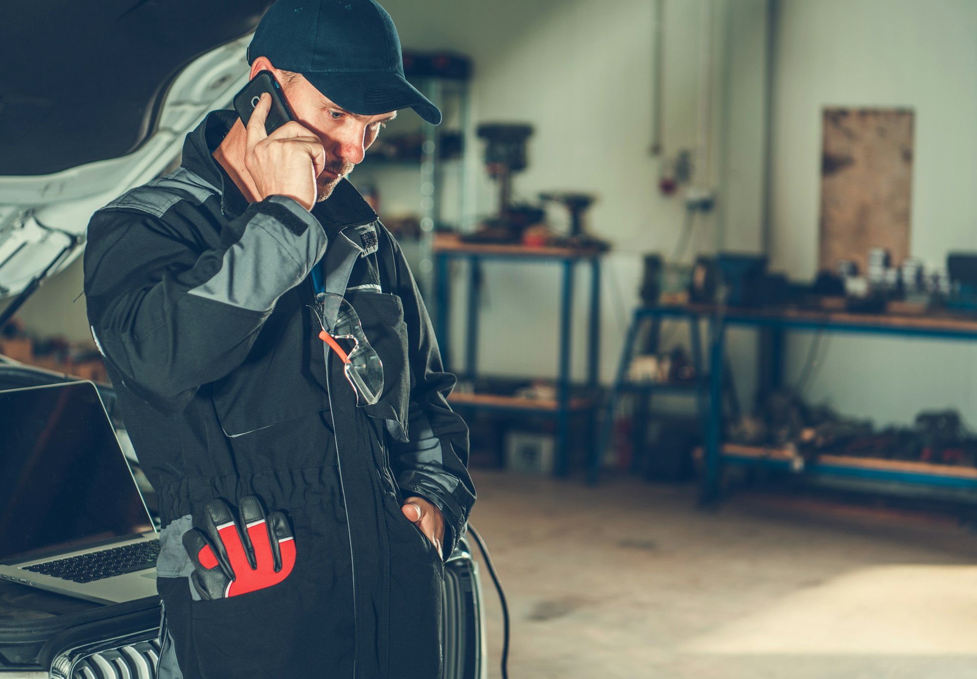 Car Mechanic Making Call